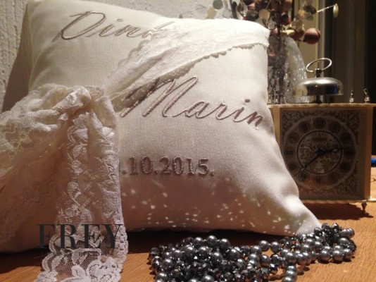 Wedding pillow with personalized embroidery